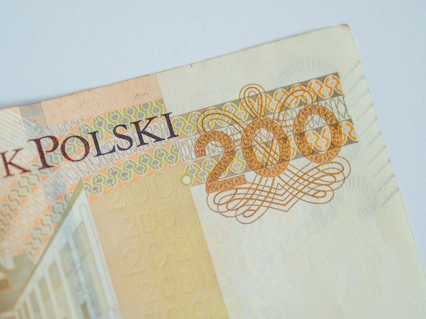 High-resolution closeup of a 200 Polish Zloty note, showcasing currency design.
