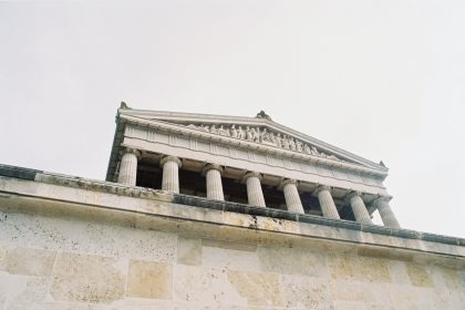 white building with columnds